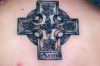 cross back tattoo